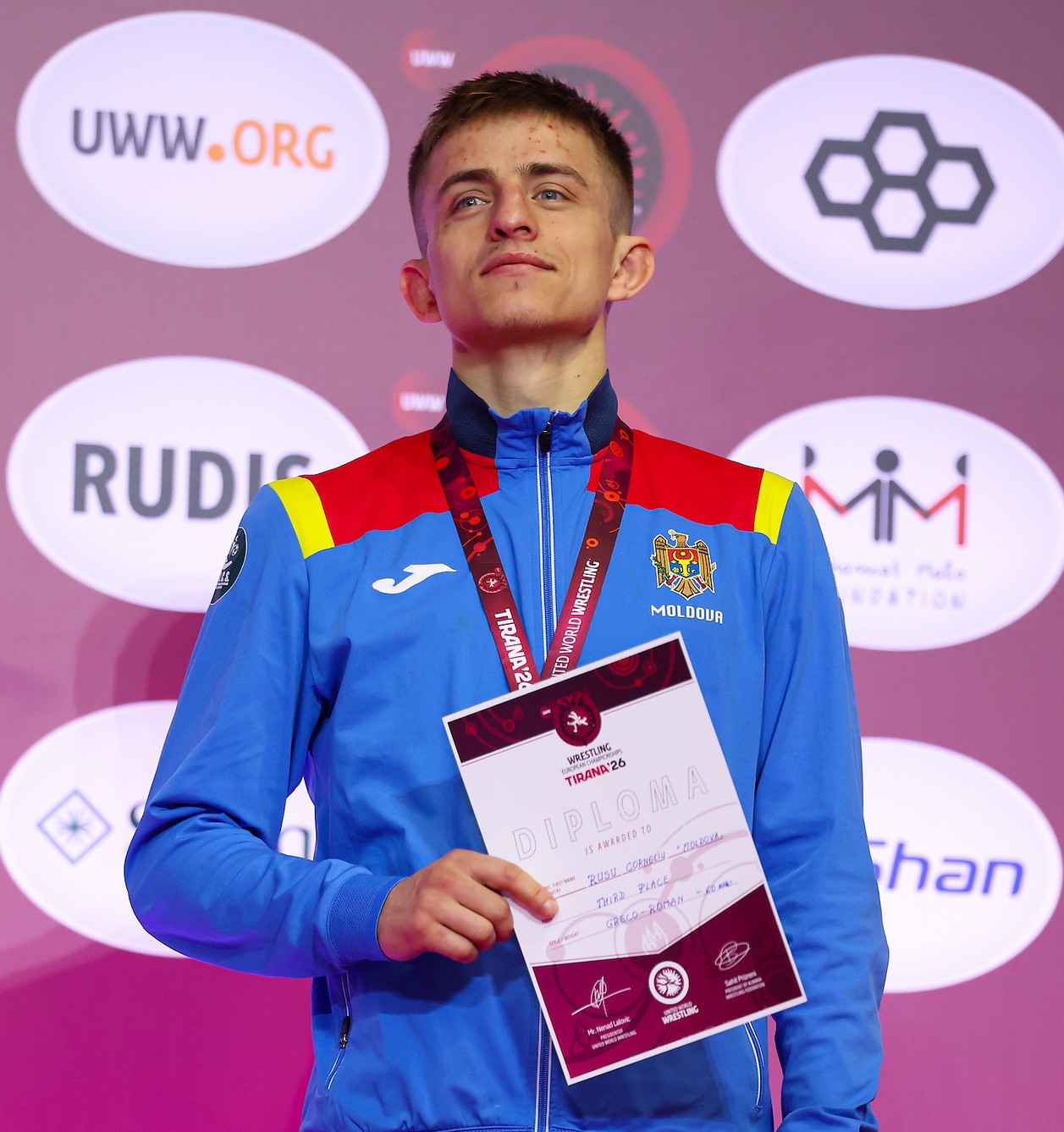 2026.04.22_RKG_Freiburg_1._Bundesliga_Ringen_Corneliu_Rusu_EM_Bronze_Limit_bis_60_Kilo_Sponsor_Hirsch_Bier_Wurmlingen_01_Foto_United_World_Wrestling_Kadir_Caliskan