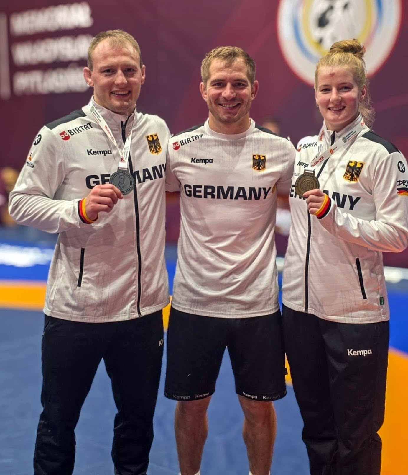 2026.08.29_RKG_Freiburg_1._Bundesliga_Polen_open_Lars_&_Sophia_Schäfle_mit_Coach_Ion_Vasilachi_Sponsor_Hirsch_Bier_Wurmlingen